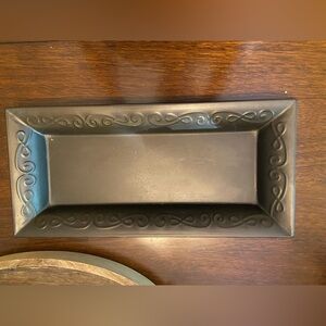 Little metal tray for putting decor or personal items in.